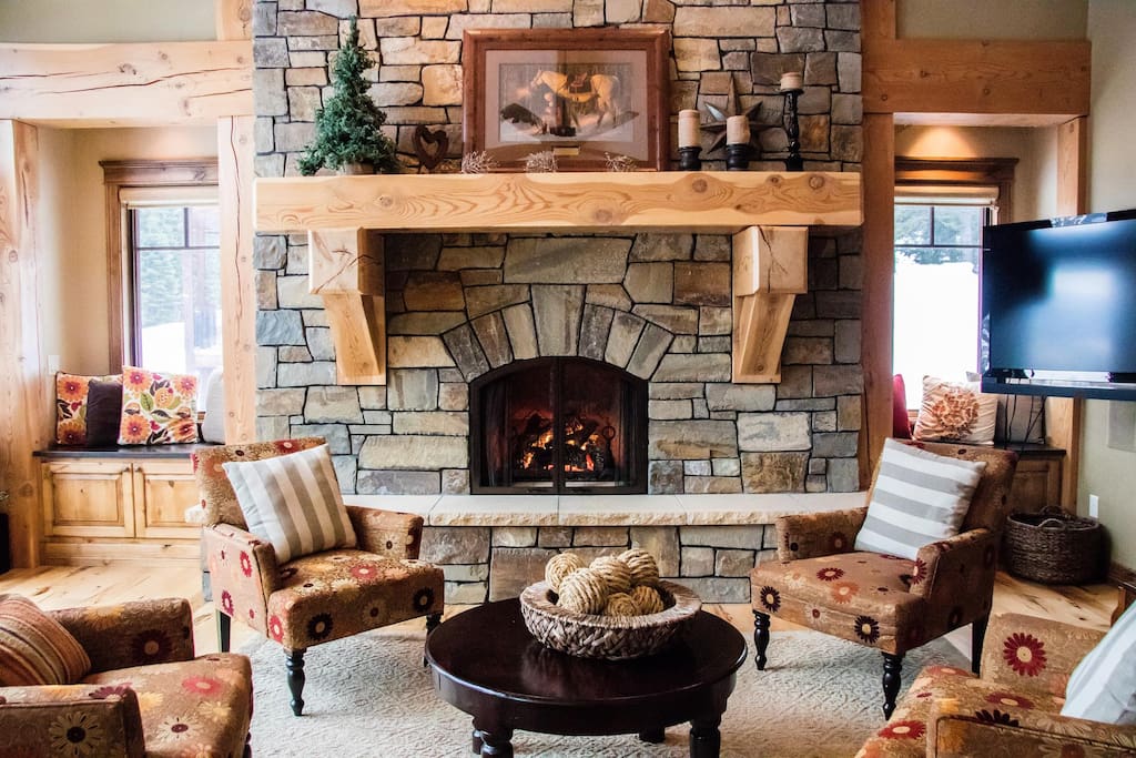 Fireplace and massive wood beam mantle