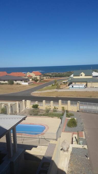 View from upstairs Balcony of Pool and Ocean views
