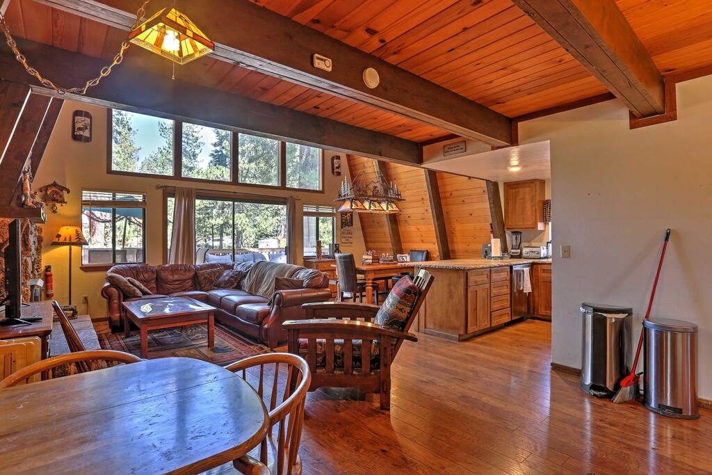 The cabin features an open rustic layout in the living area.