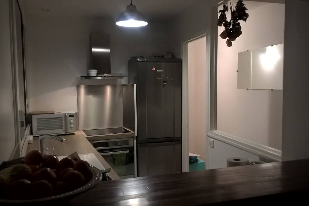 Coin cuisine ouvert sur le séjour