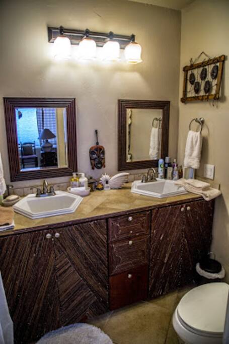 The private bathroom adjacent to the bedroom and den