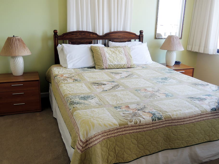 Comfortable king size bed with extra pillows