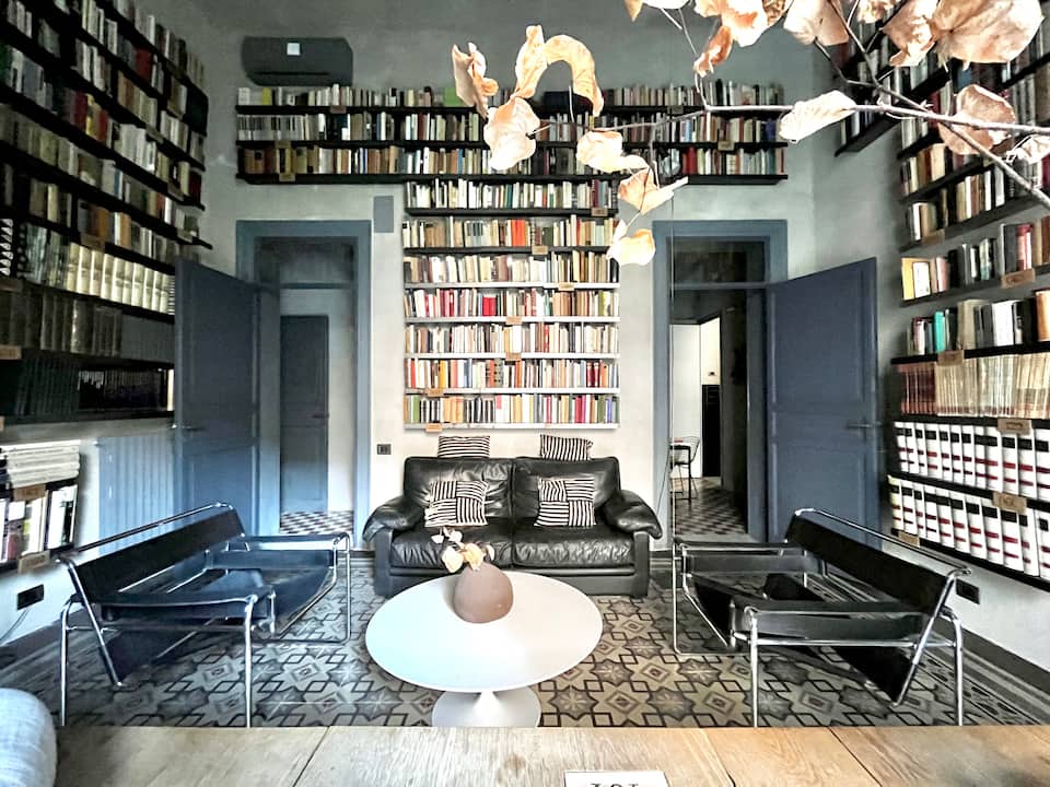 A designer's Art Nouveau flat lined with books, Palermo, Sicily, Italy, photo 1 of 10