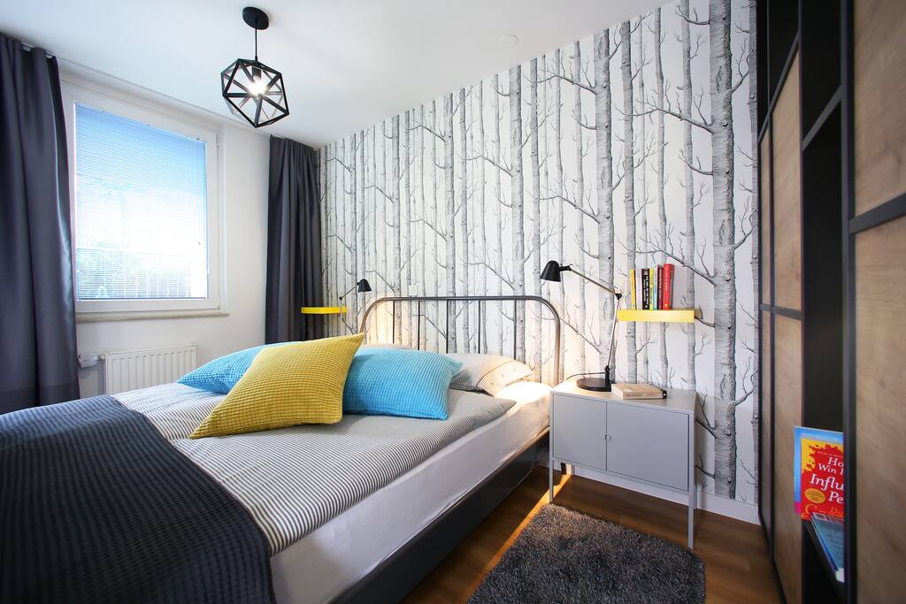 Comfy king size bed with high quality mattress for your sweet dreams. Blackout curtains will let you sleep in without waking up by daylight.