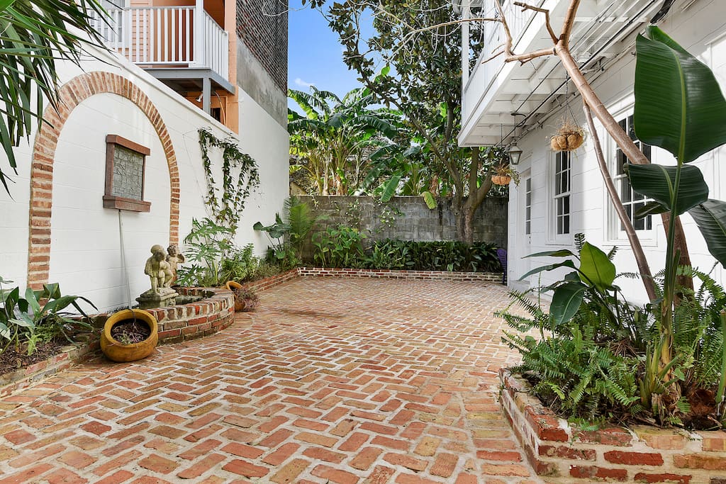 Relax in our manicured French Quarter red bricked Courtyard for sipping your coffee or cocktails morning or night.