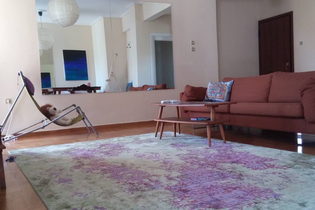 Relaxing living room with wonderful balcony to Acropolis view