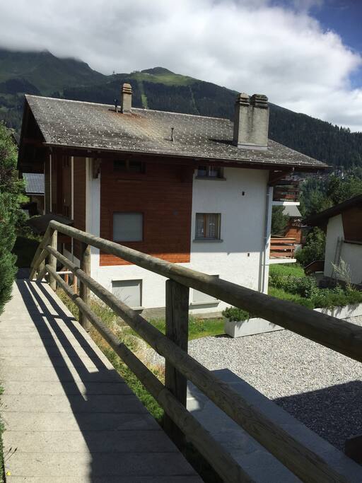 Petit Bonheur is in a lovely peaceful spot off the road down a little path, yet still only 2 minutes from the ski bus!
