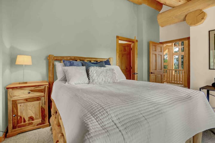 The Queen room is accessed up the stairs and off of the loft area - there is a full connected bathroom with sauna!