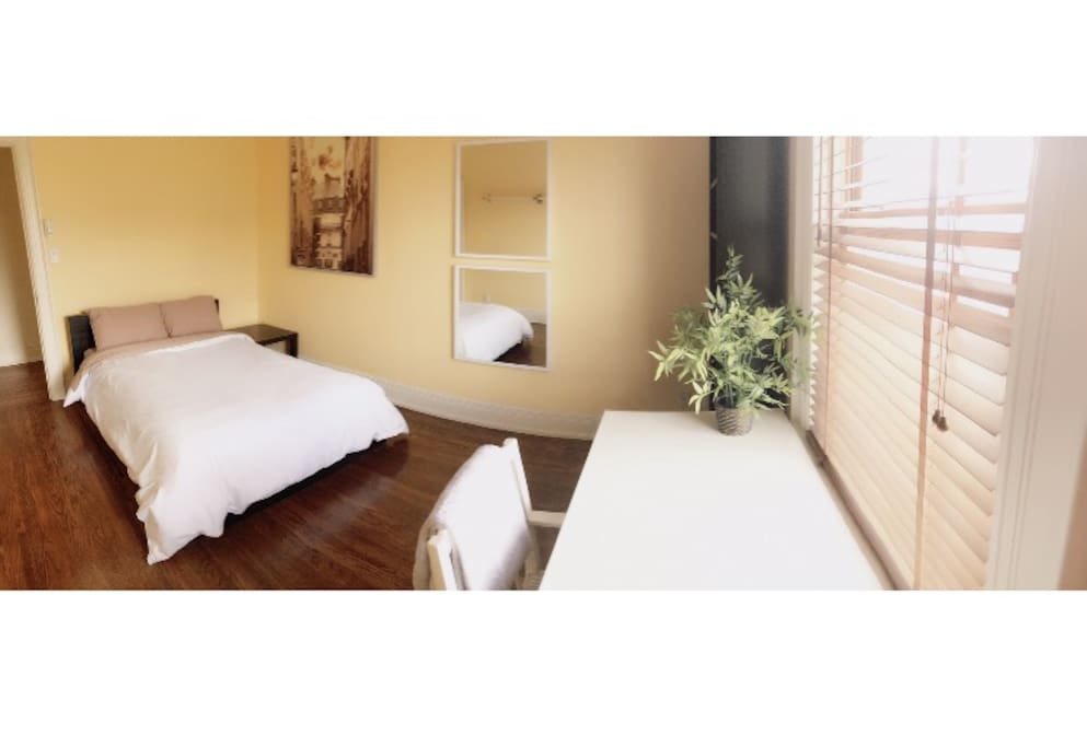 Sunny and spacious bedroom with study.