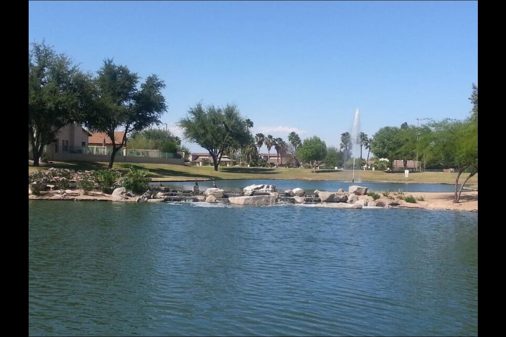 Beautiful park with walking path, tennis court, playground, basketball court one block away.