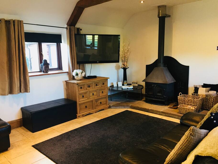 Lounge complete with log burning fire