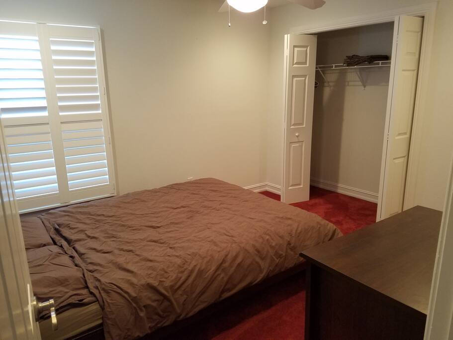 Your own private bedroom complete with closet, hangers, and Queen size bed.