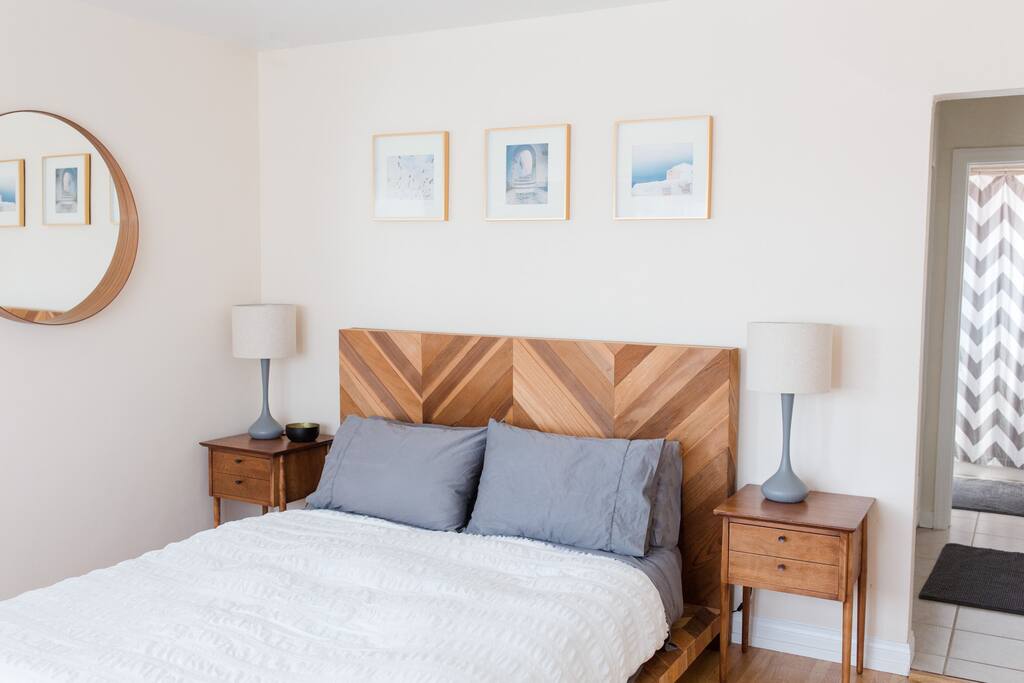 Bright bedroom with new mattress, lots of pillows and down comforter. Super Cozy!