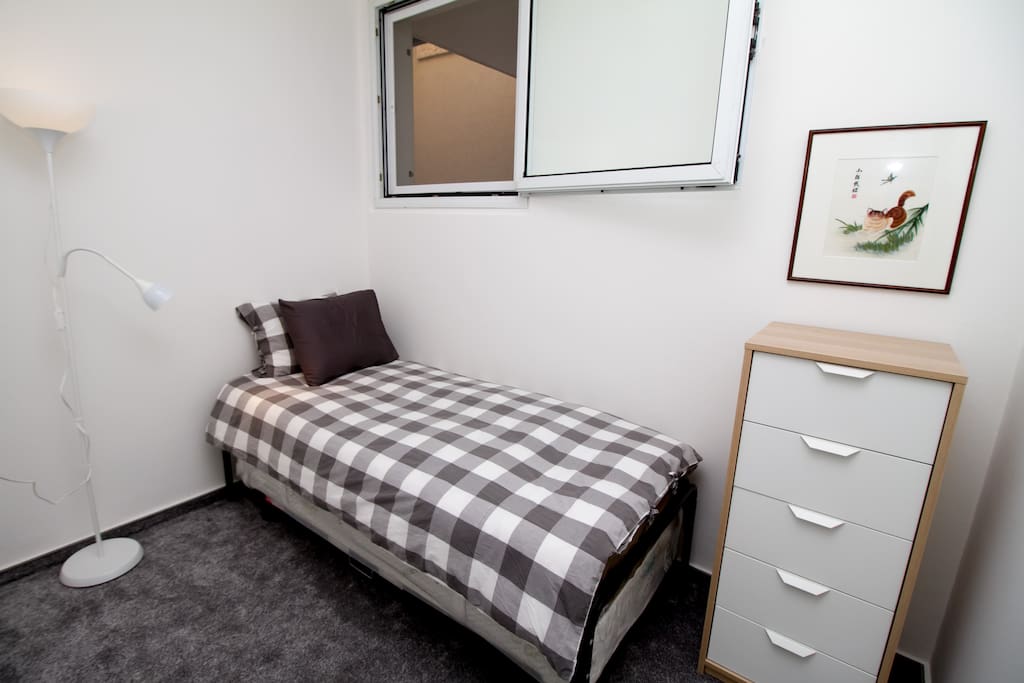 Bedroom with bed as a single, full size twin with comfortable American mattress