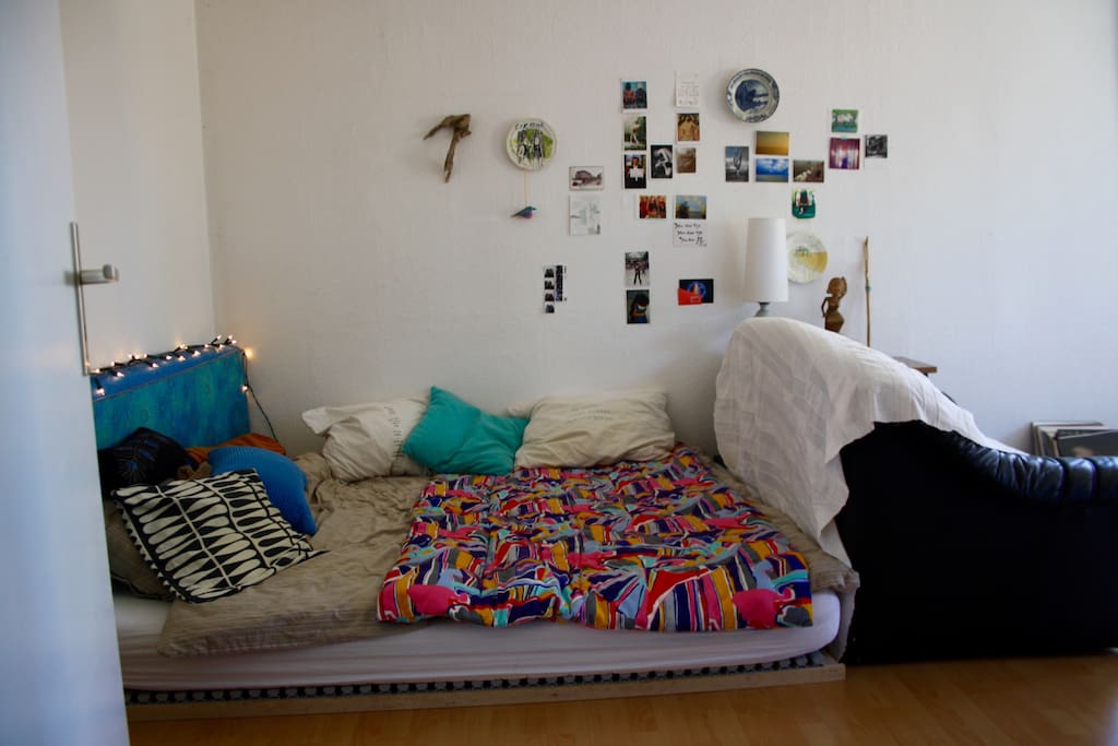 My bed consists of two good 80 cm matrasses (on a Lattenrost), fits 1 (very spaciously), or 2 (still spaciously!:-)