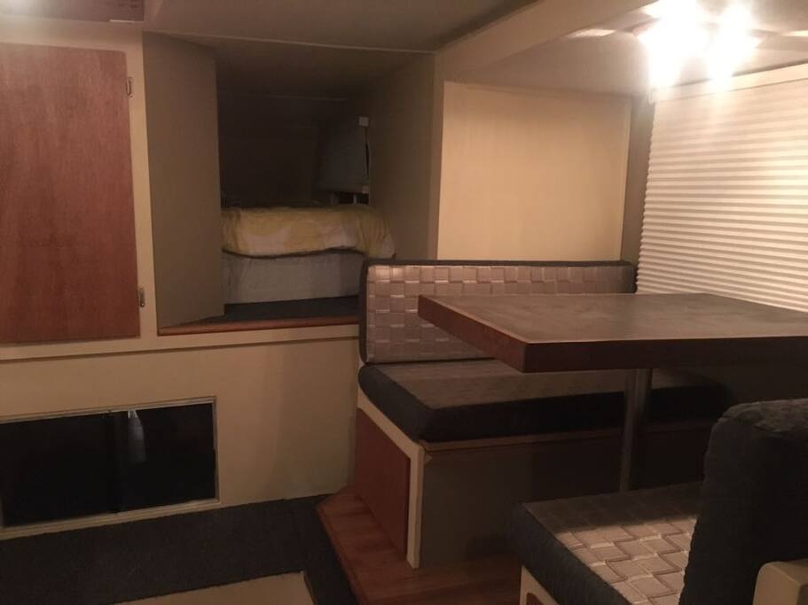 Table/seat area has two outlets and converts into small bed