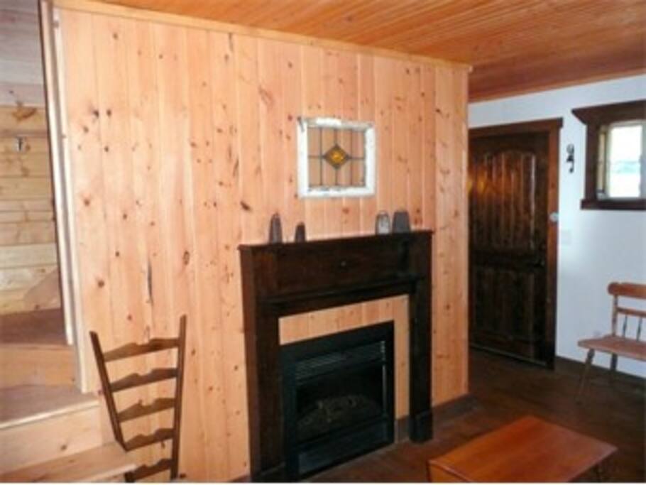 Family Room off the entry way with Electric Fireplace