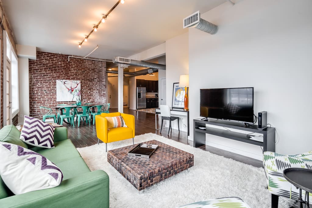 Living room looking towards kitchen. Very comfortable seating with 48" high def TV with Netflix, HD TV stations, and streaming if you have Amazon or Hulu