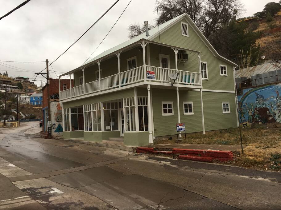 The house has a wraparound veranda overlooking the famous Gulch