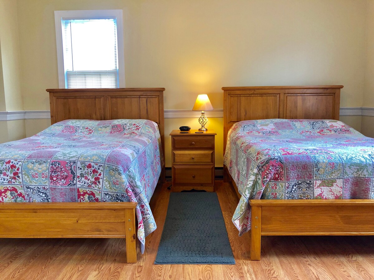 Spacious, Light, and airy 4th Bedroom with two double beds and private entrance