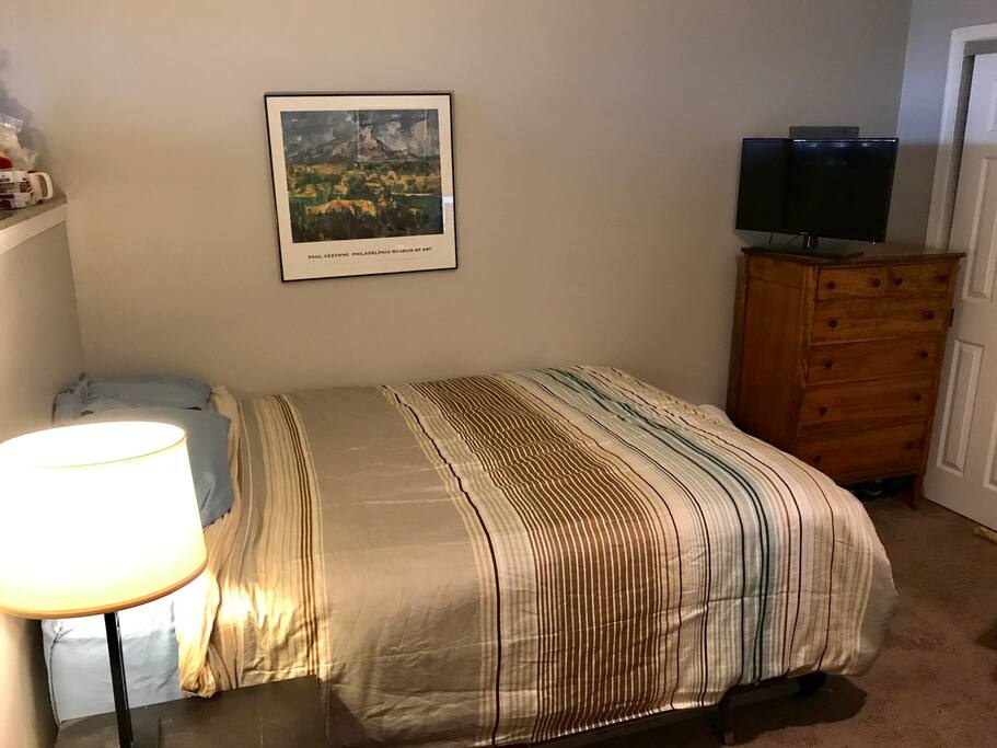 Queen bed in loft bedroom