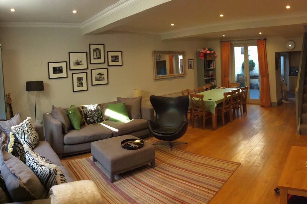 Living room with front and back patios