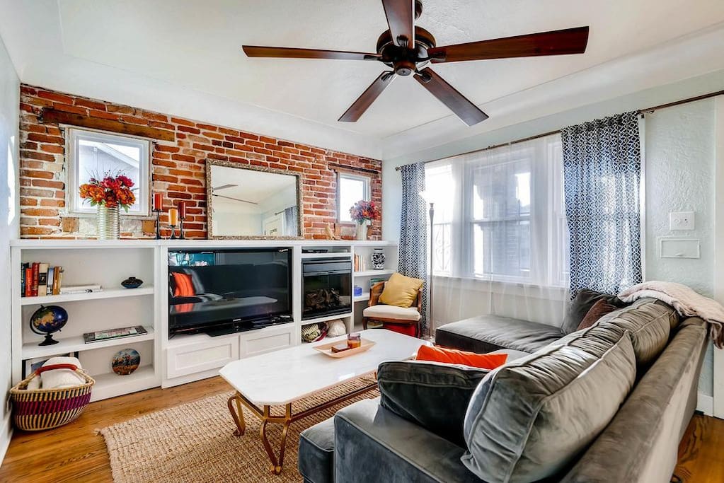 Modern and comfy living with Cable TV (HBO)