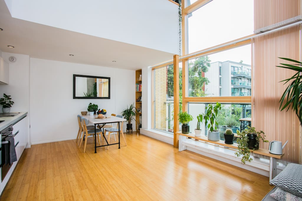 Double-height windows provide wonderful lighting throughout the day
