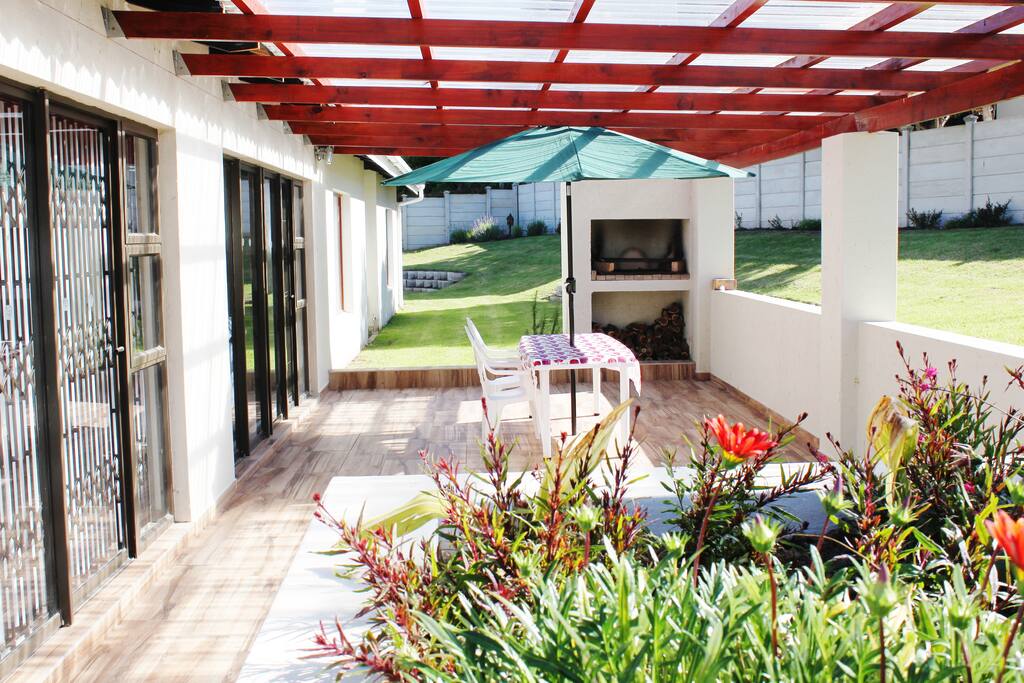 Sunny outdoor patio with built-in braai