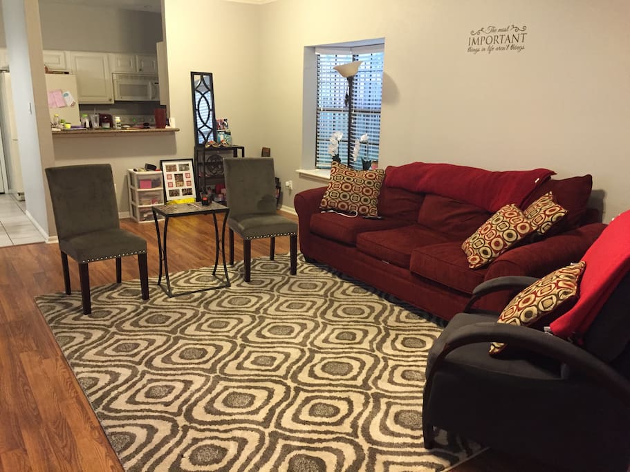 Living room with extra large couch and space for air mattress