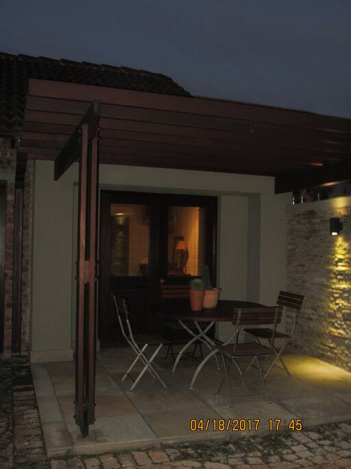PATIO AND ENTRANCE TO ROOM