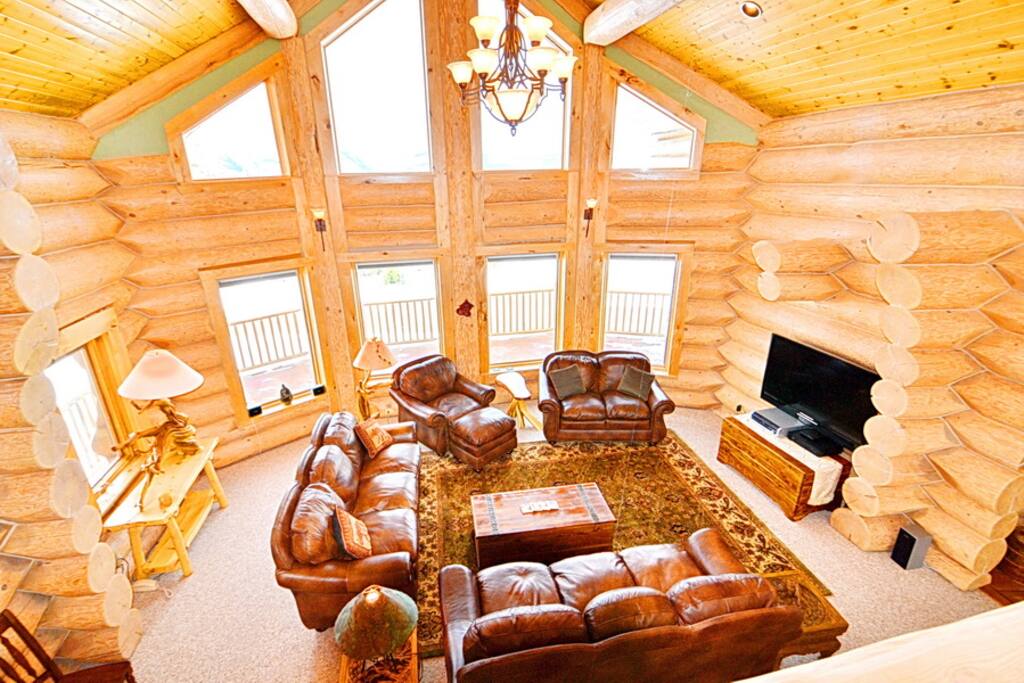 The main living room offers vaulted ceilings and amazing views!