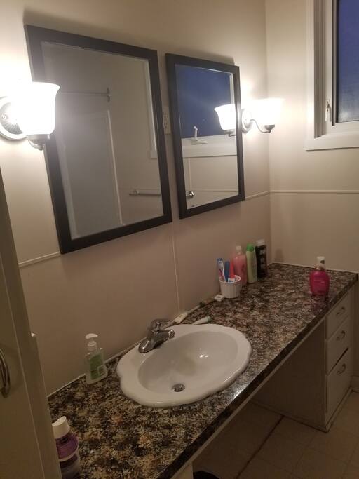 2 big mirrors above the sink.