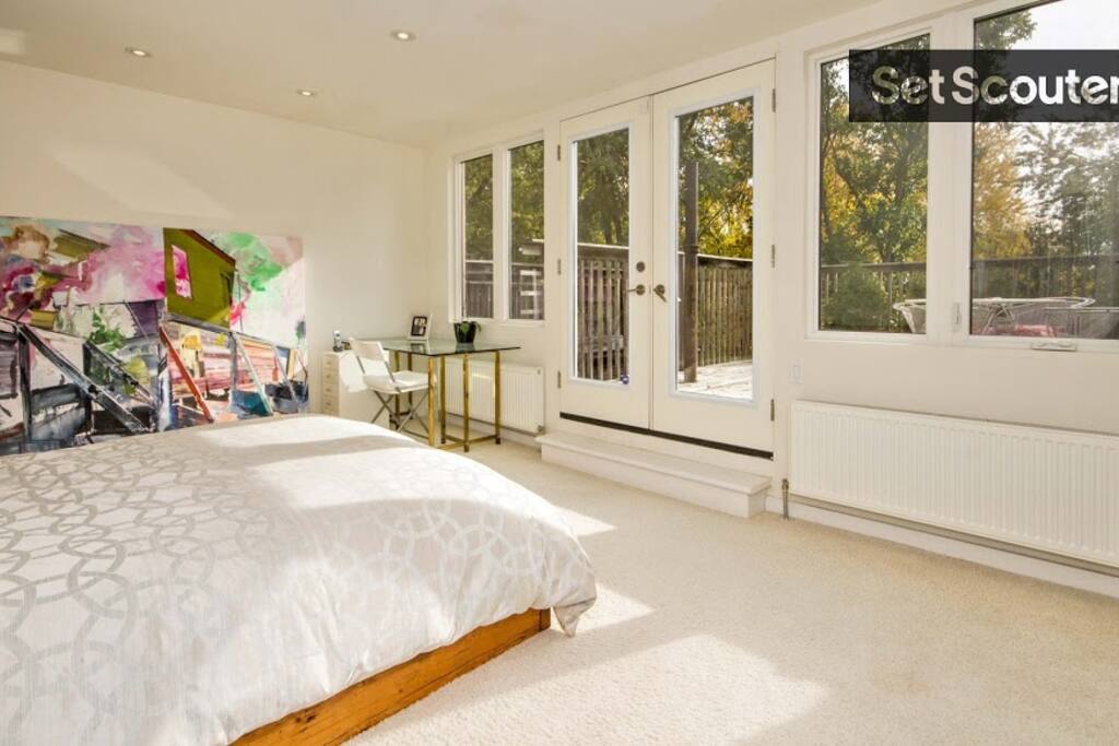 Master bedroom on the 3rd floor with queen bed and lovely sunlight.
