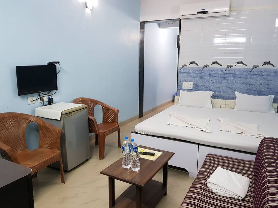 bed room with sofa cum bed