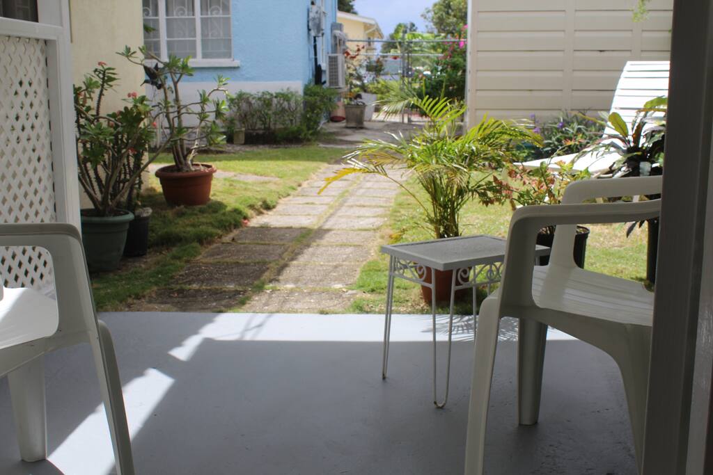Patio, showing path from front gate to studio apt.