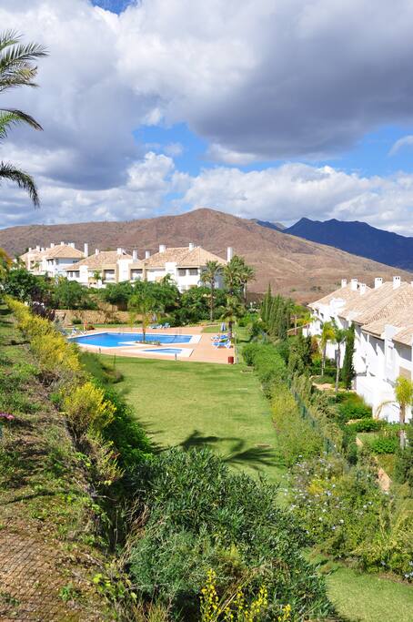 The townhouses, built around various swimming pools, facing the golf course.