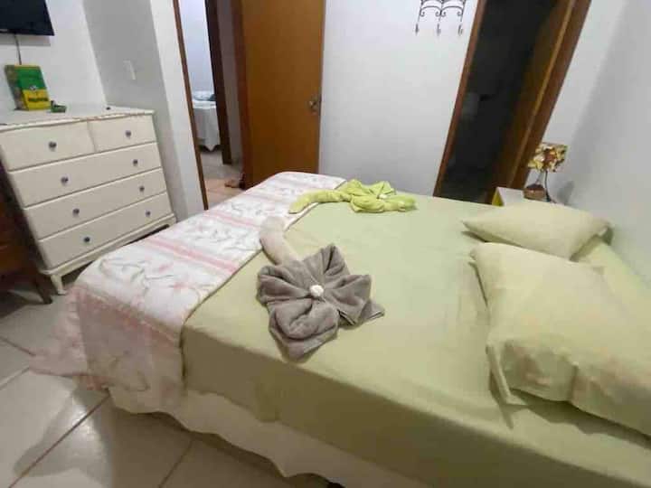 Suite 2 with queen-size bed. Space for single mattress on the floor