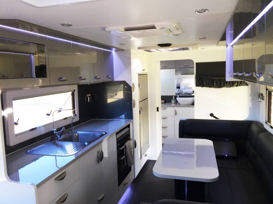 The kitchen has an oven,cooktop,microwave,pullout pantry and lots of storage