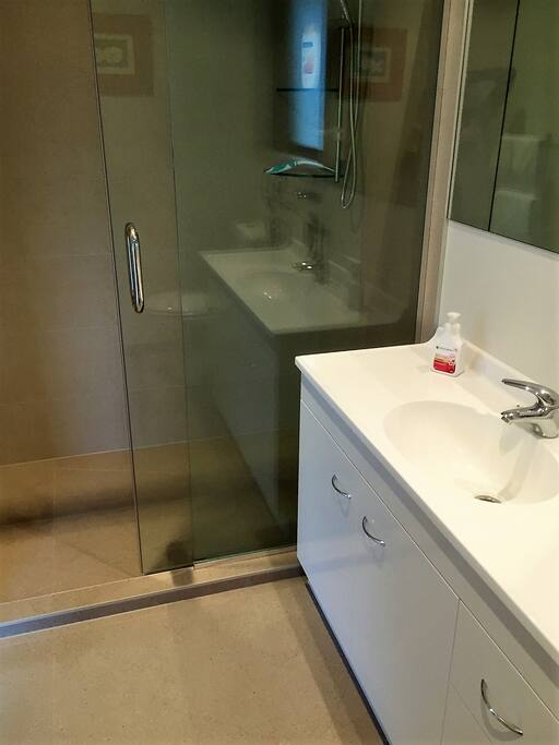 Beautiful new tiled bathroom with spacious shower