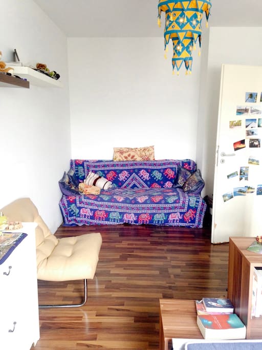 other side of the room with couch (possible for a third person to sleep on)