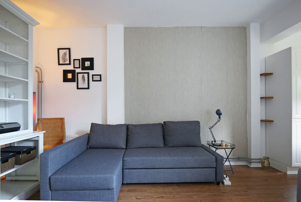 Corner sofa which turns into a double bed