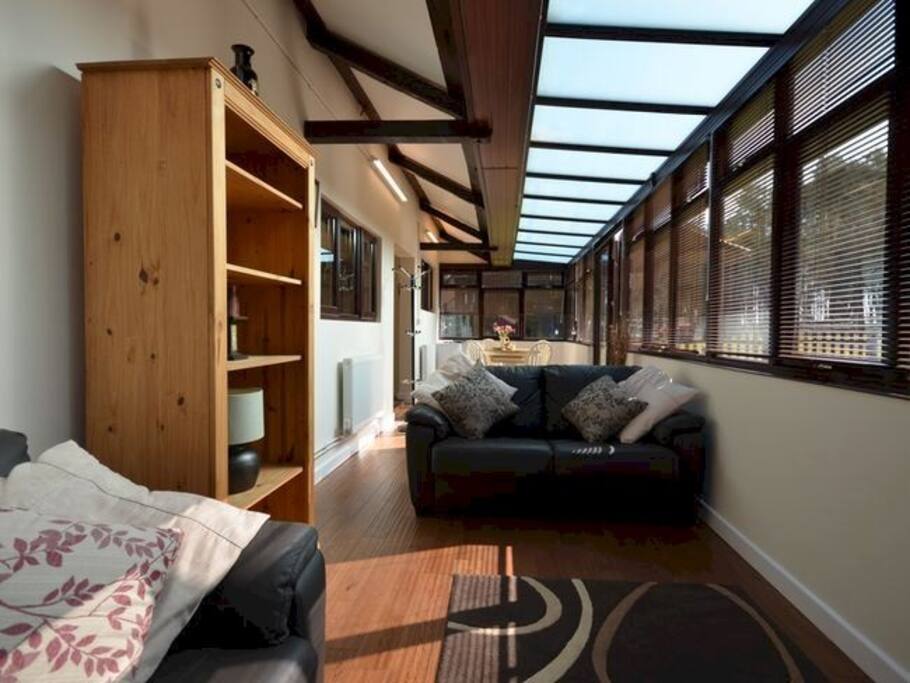 Living area with 42” smart TV, Blu-Ray DVD and Wi-Fi.