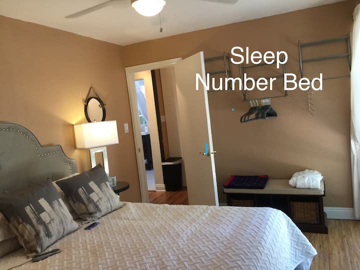  SLEEP NUMBER  DUAL CONTROL BED
Adjust away till you get it just right !!
French doors open to a huge private fenced yard.