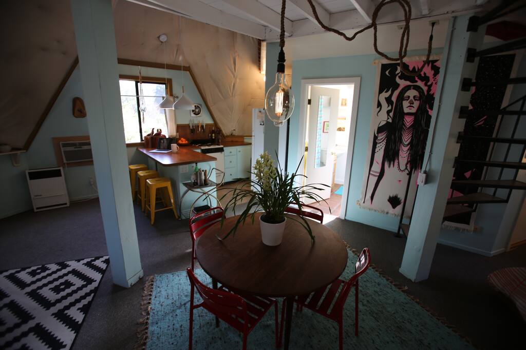 Four person table includes a leaf and extra chairs if needed.