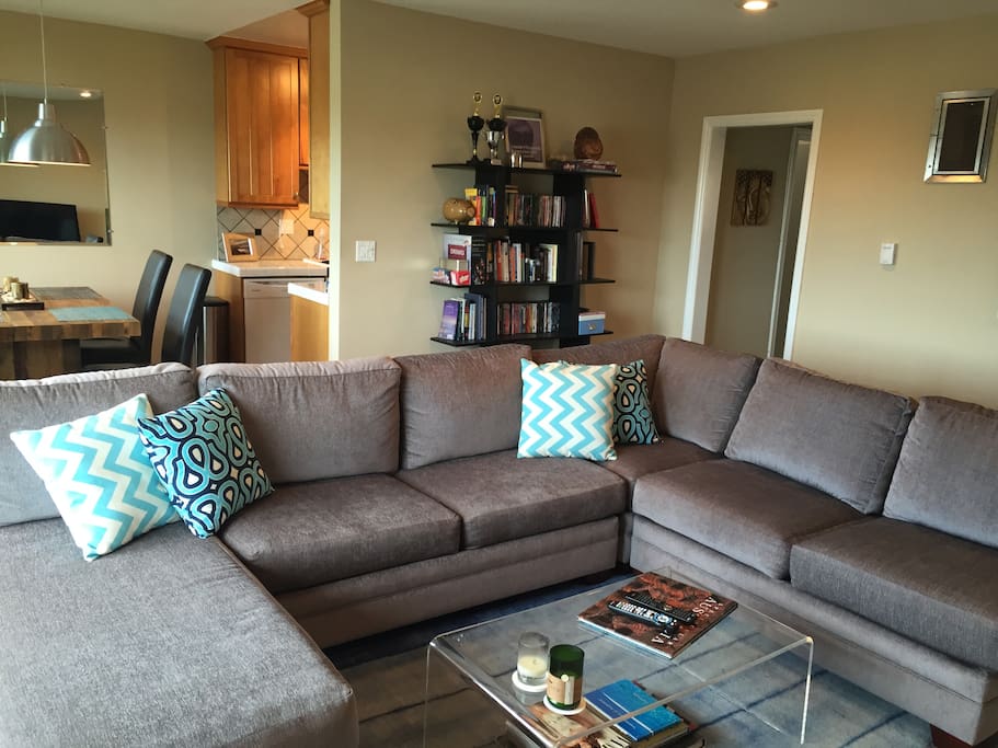 Comfy large couch for lounging and enjoying cable TV or Netflix.