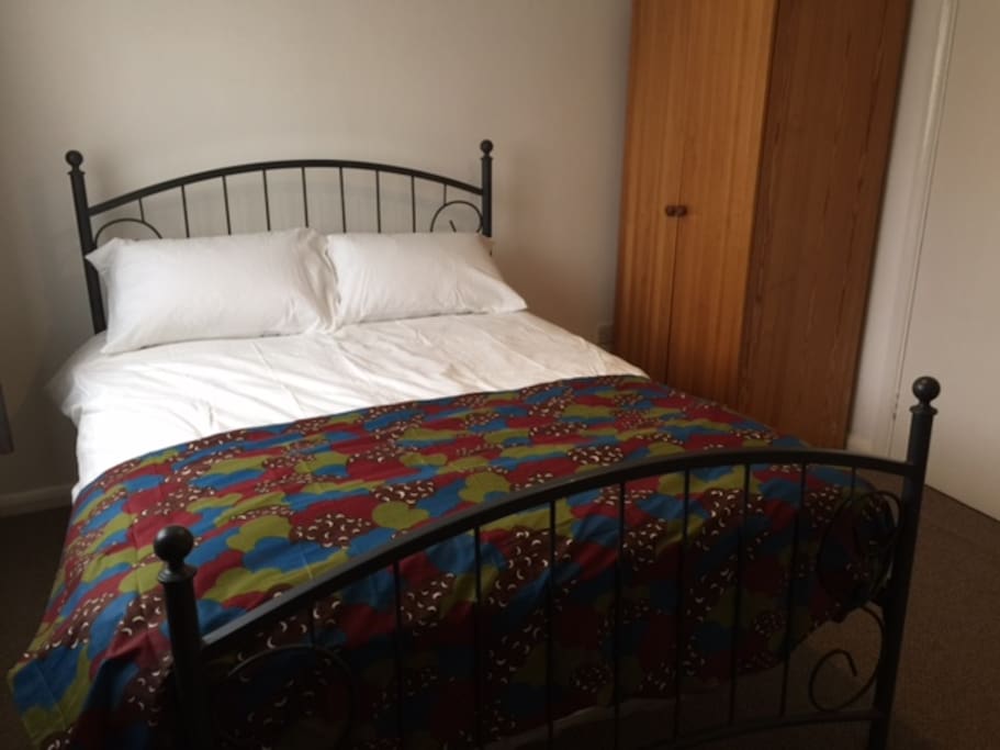 Bed and wardrobe