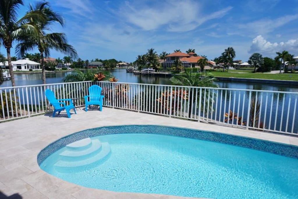 Pool, lanai and water view