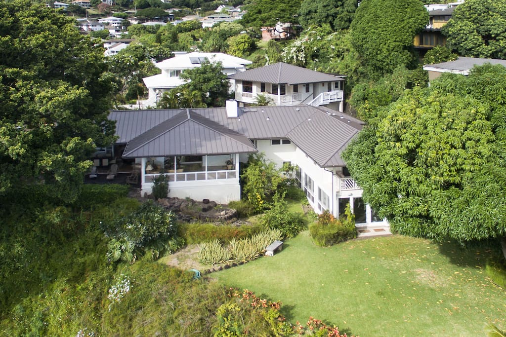 Aerial view of property beautiful gardens and backyard