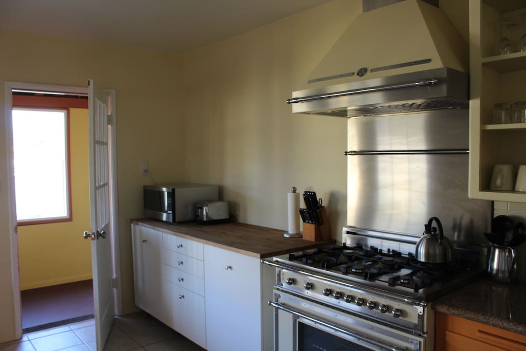 Kitchen with Professional Bertazzoni top of the range gas Range (6 burners)